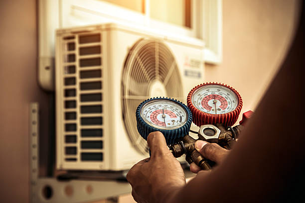 Professional Ac Installation technician working in Tom Bean, TX